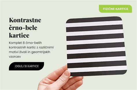 Kontrastne črno-bele kartice nad posteljico